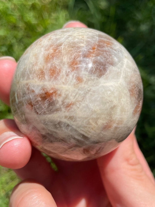 Moonstone with sunstone flashy sphere